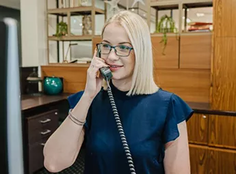 Dedicated Servcorp receptionist at Barangaroo, tower 1 providing professional call answering and personalised client support.